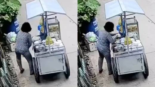 VIDEO: Cachan a mujer embarrándose los platos de comida que está a punto de vender