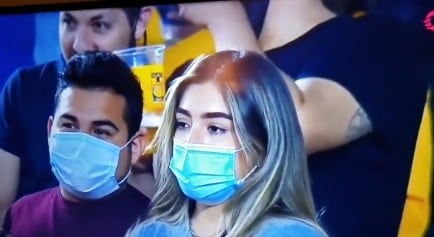 Jóvenes en partido de Club Tigres