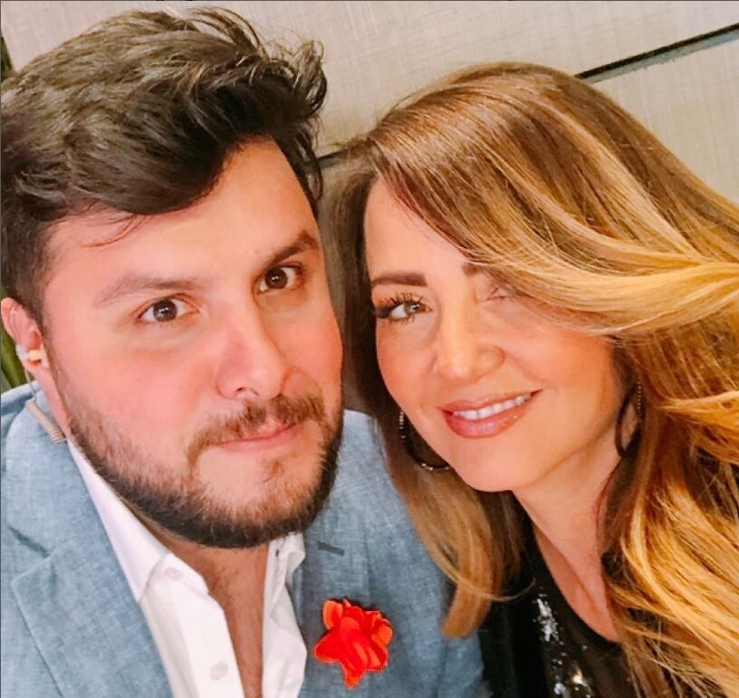 Andrea Legarreta y Paul Stanley