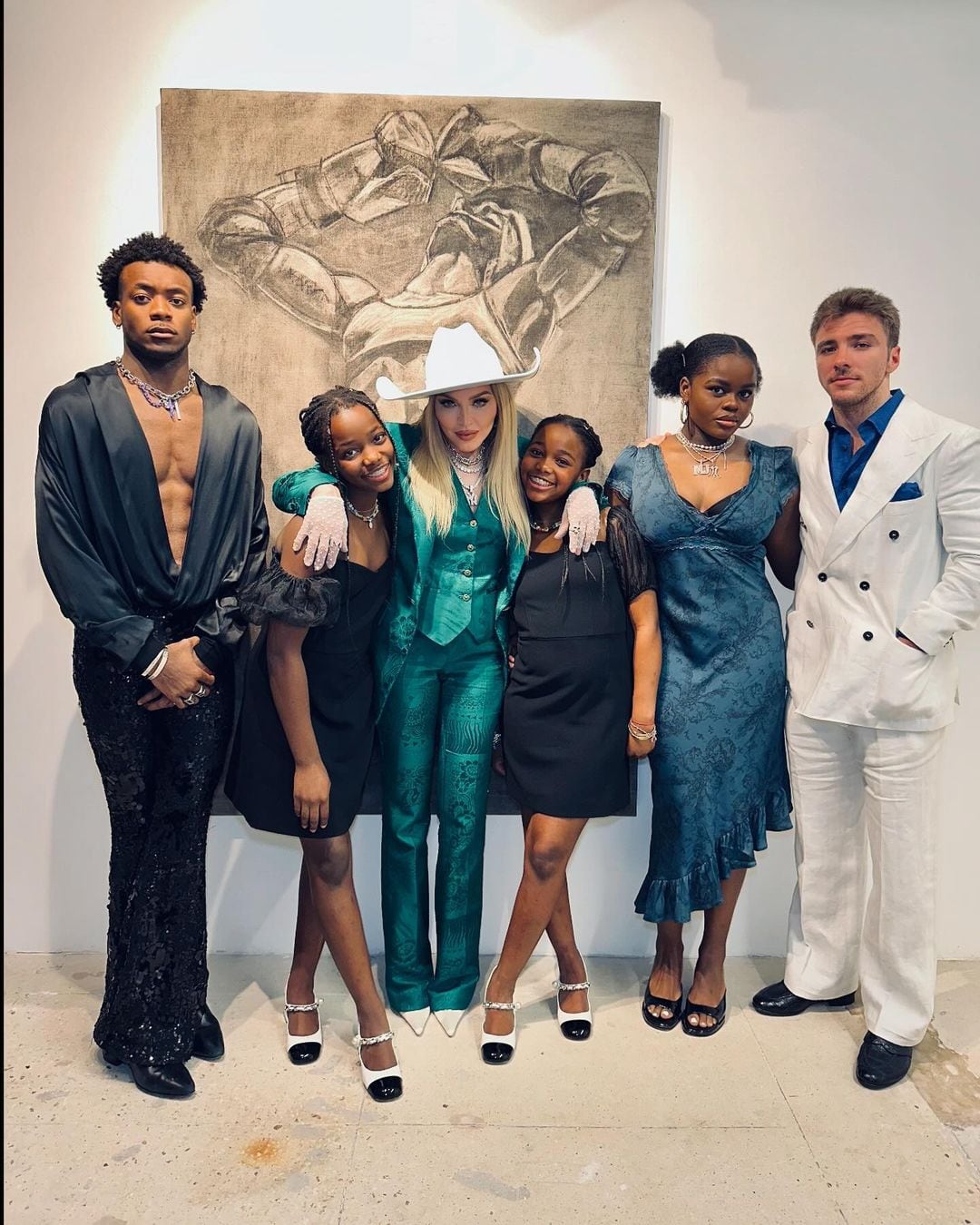 Madonna con sus hijos