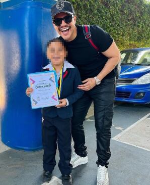 Eduin Caz e hijo