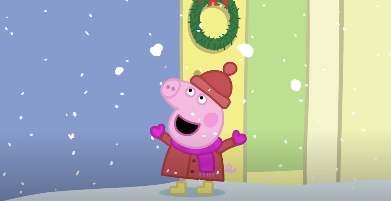 Peppa Pig y Candy Gato juegan en la nieve