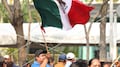 Una bandera, dos cachuchas