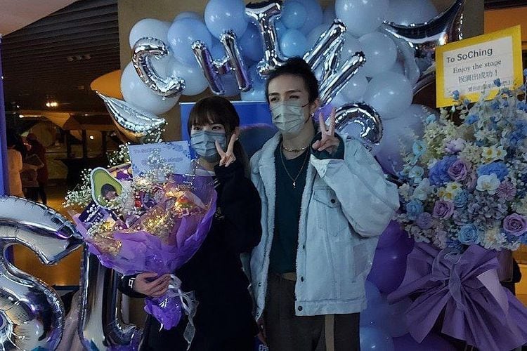 Mo, bailarín y su novia So Ching.