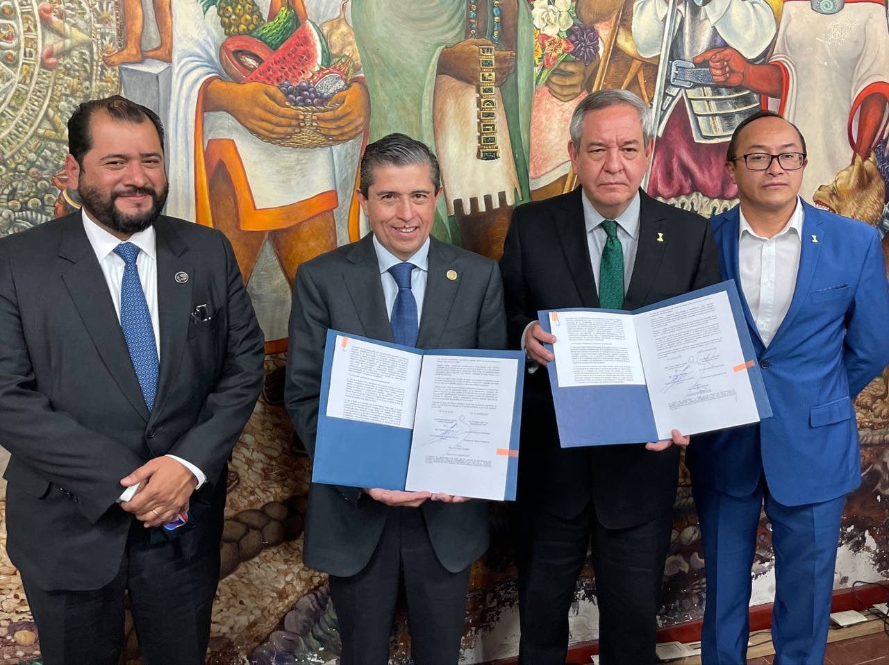 Giovani Gutiérrez con funcionarios y el rector de la Universidad YMCA