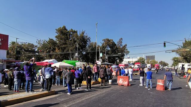 Tras la detención de 10 personas por presunto delito de extorsión, comerciantes se manifiestan en avenida Jardín y piden su liberación