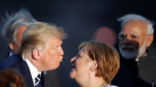 Trump y Angela Merkel en la cumbre del G7.