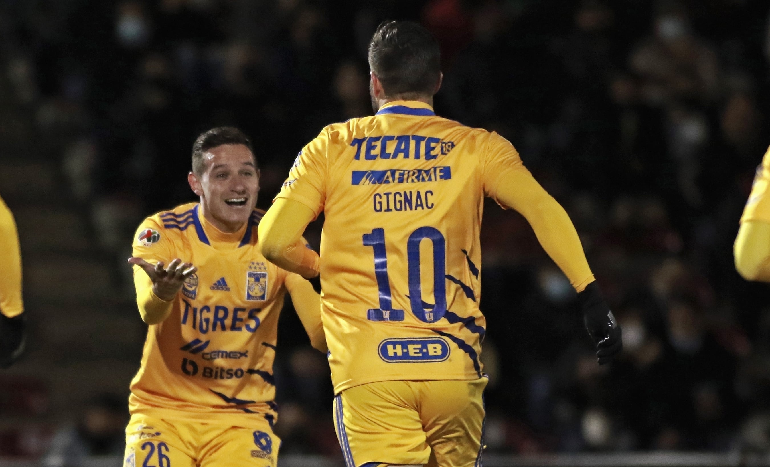Florian Thauvin y André-Pierre Gignac
