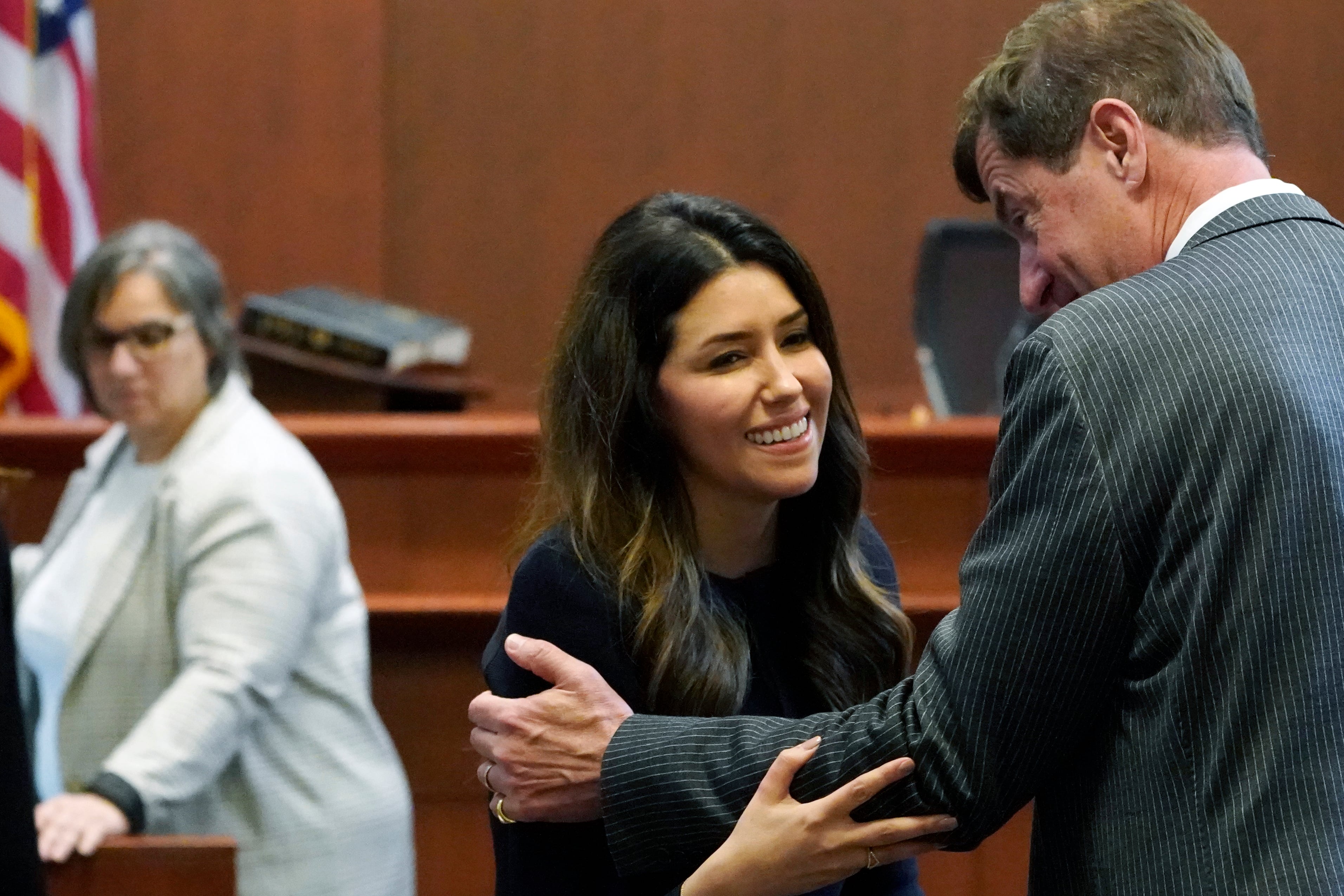 Attorney Camille Vasquez talks with attorney Ben Chew (AP Photo/Steve Helber, Pool)
