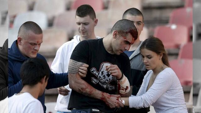 FOTO: Suspenden partido por violencia en las tribunas