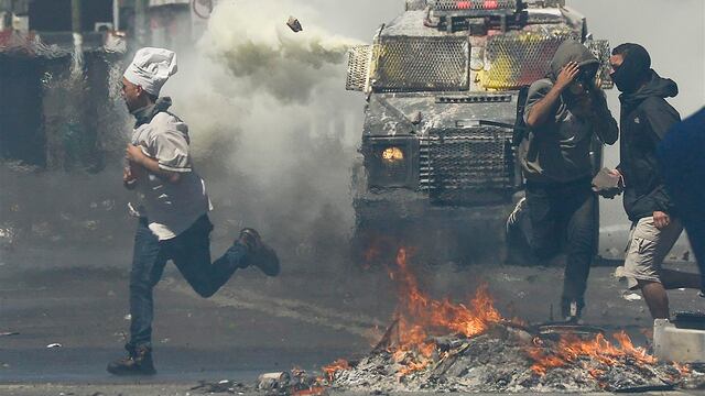 Van 18 muertos por protestas en Chile.