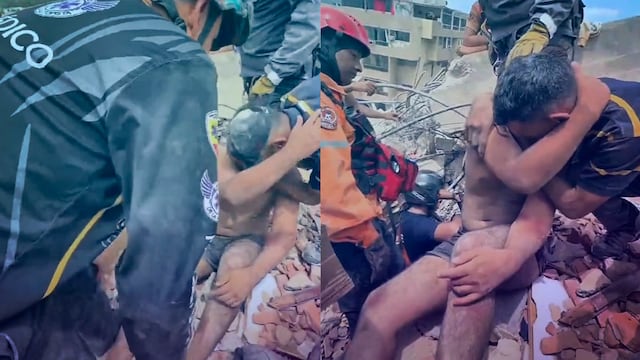 Rescatista llora junto a joven salvado de entre los escombros