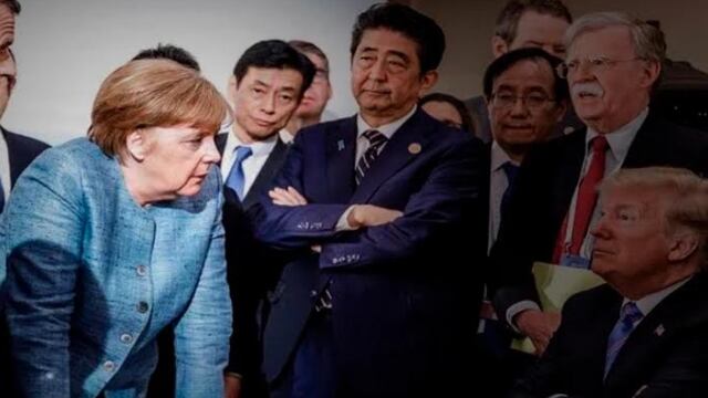 Angela Merkel frente a Trump en 2018, rodeada por líderes mundiales que escuchan y callan/Jesco Denzel—EPA-EFE/Shutterstock