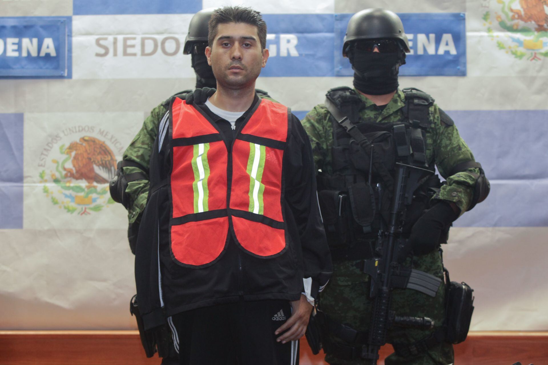 Erick Valencia Salazar presentado como detenido el 12 de marzo de 2012