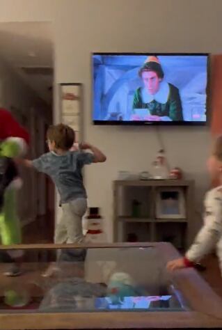 Reacción de un niño al ver al Grinch