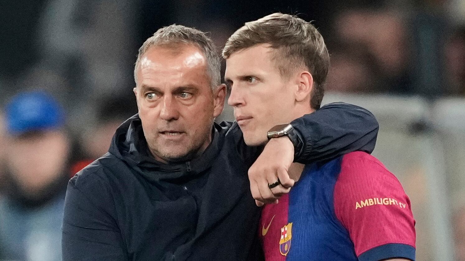 Hansi Flick y Dani Olmo en el FC Barcelona vs Borussia Dortmund.