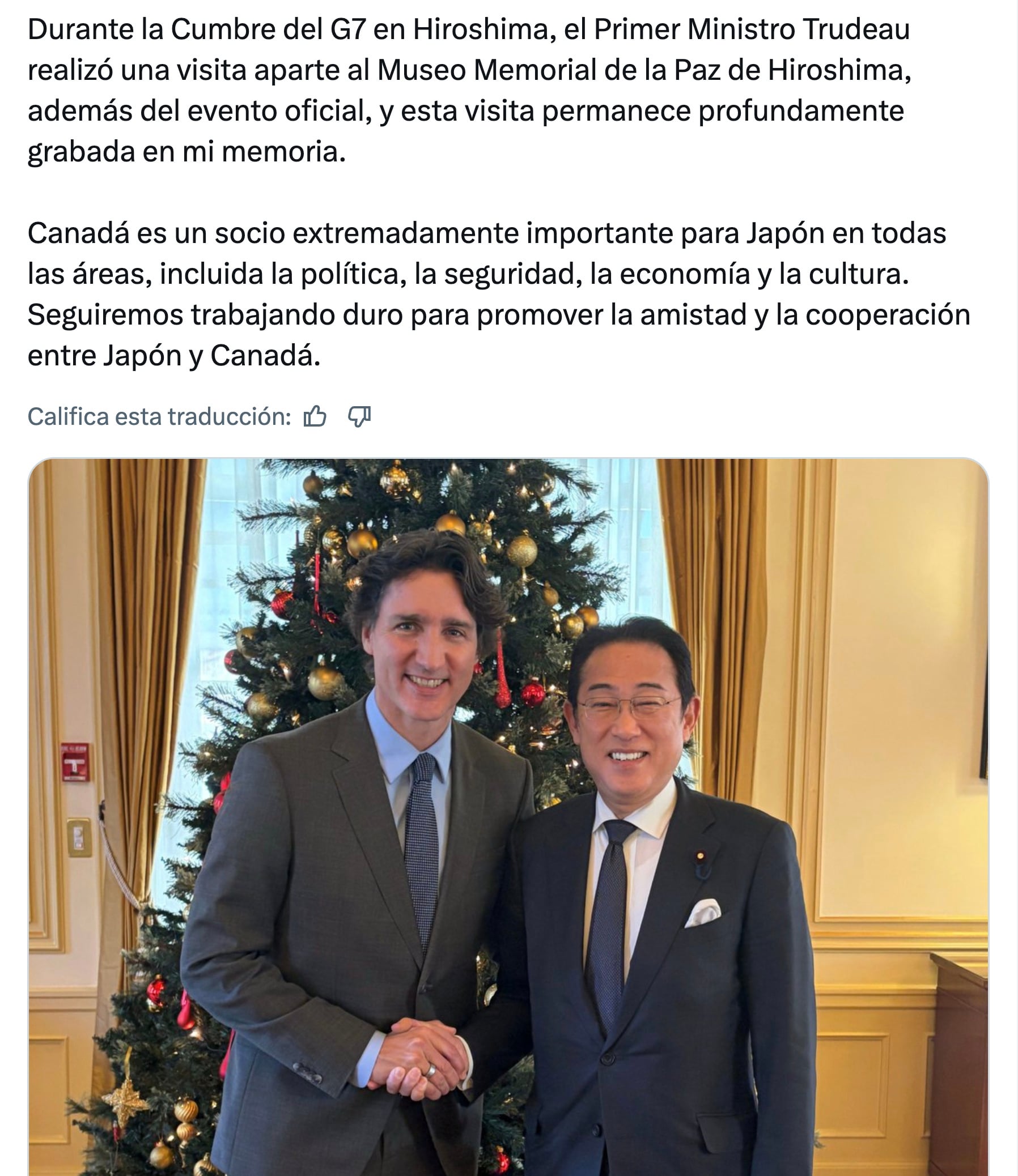 Justin Trudeau y Katy Perry con el ex primer ministro de Japón