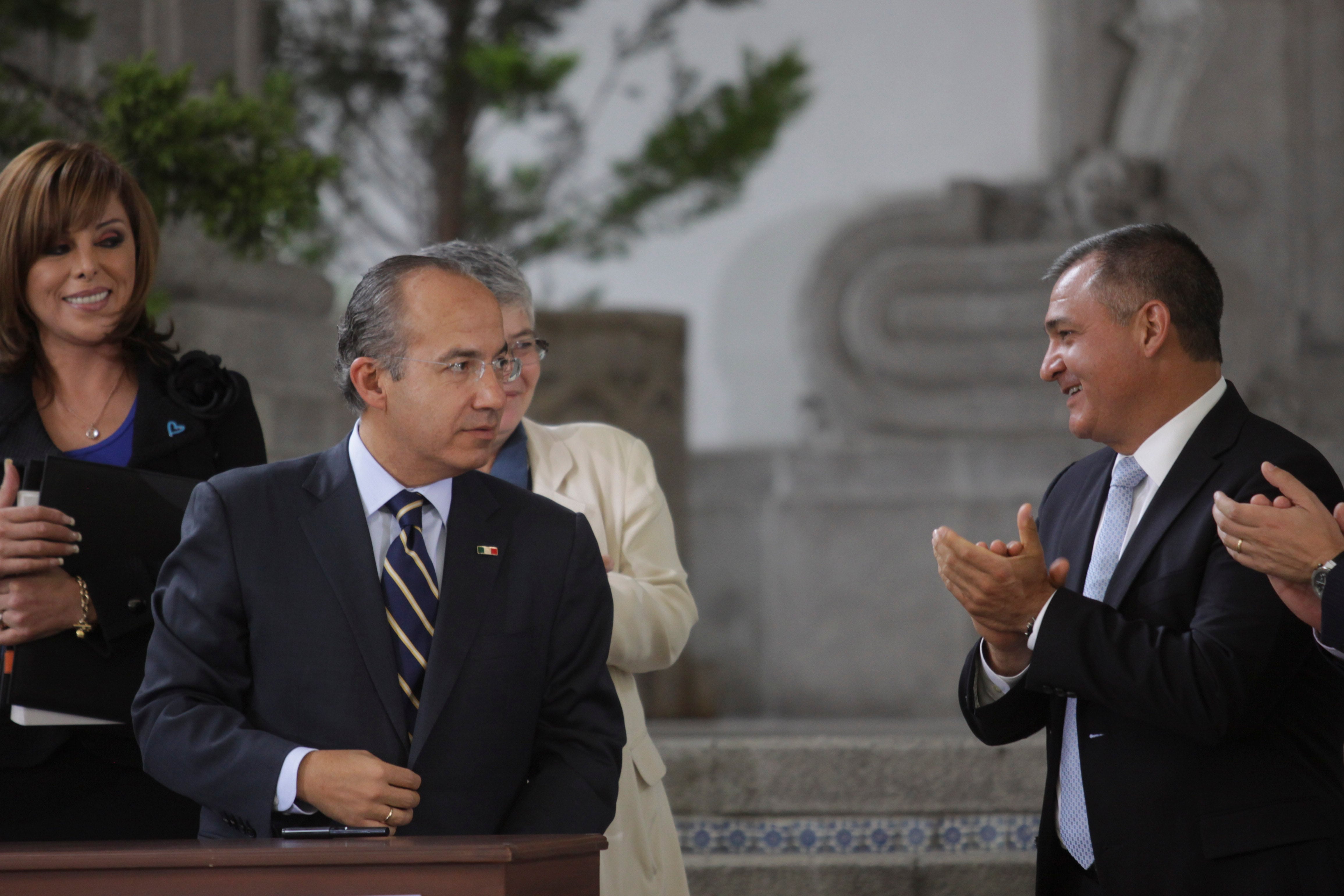 Felipe Calderón y Genaro García Luna en 2012.