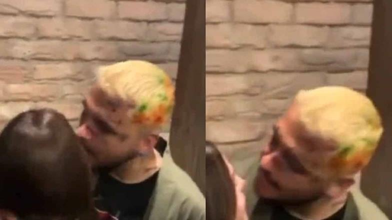 Christian Nodal intenta besar a una fan en la boca; ella lo rechaza