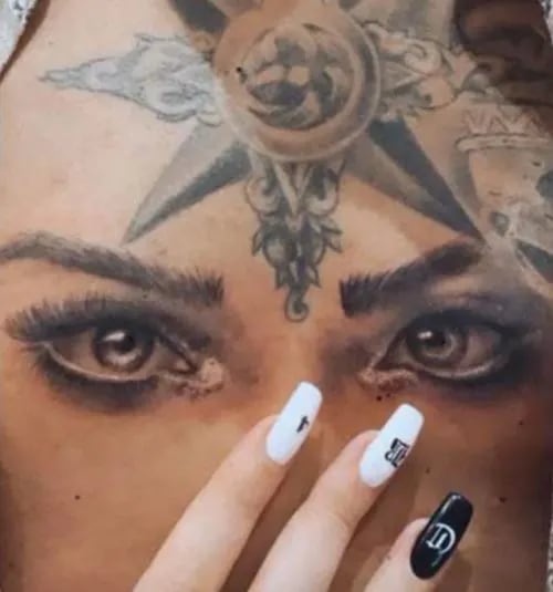 Los 4 tatuajes de Christian Nodal sobre Belinda