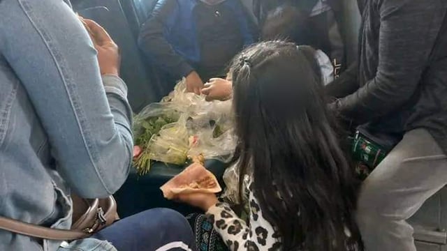 Familia comiendo taco placero