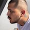 Christian Nodal se hace tatuaje en la cara en honor a Belinda (VIDEO)