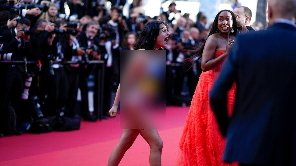 Festival de Cannes: Activista protesta contra violaciones en Ucrania (FOTOS)