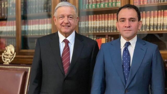 Andrés Manuel López Obrador y Arturo Herrera