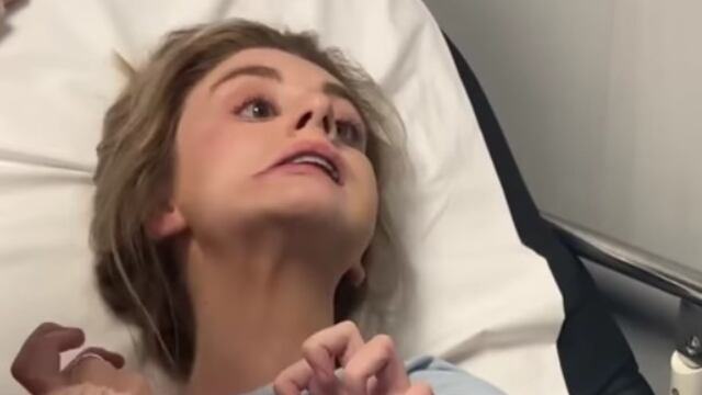 Jóven drogada con bebida en un bar