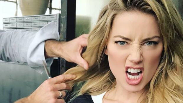 Amber Heard se dio el lujo de ignorar a Jason Momoa y a sus abultados músculos