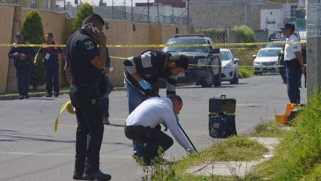 Peritos en Metepec por asesinato de juez.