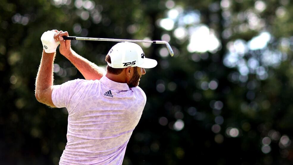 Dustin Johnson y su equipo, los protagonistas