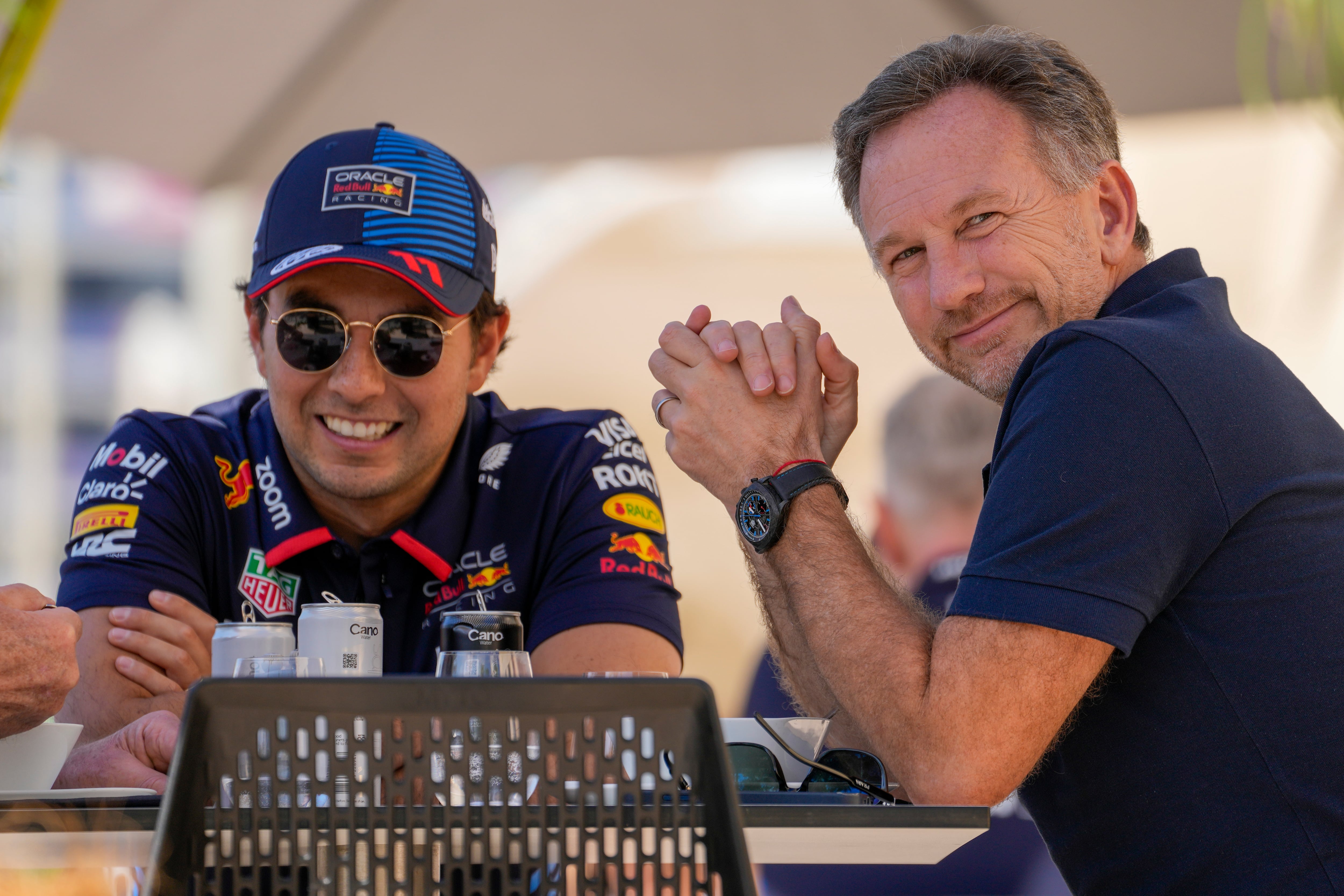 Checo Pérez y Christian Horner