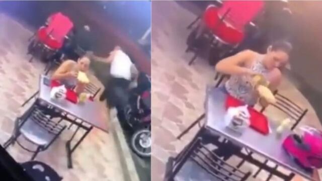 Mujer comiendo pizza