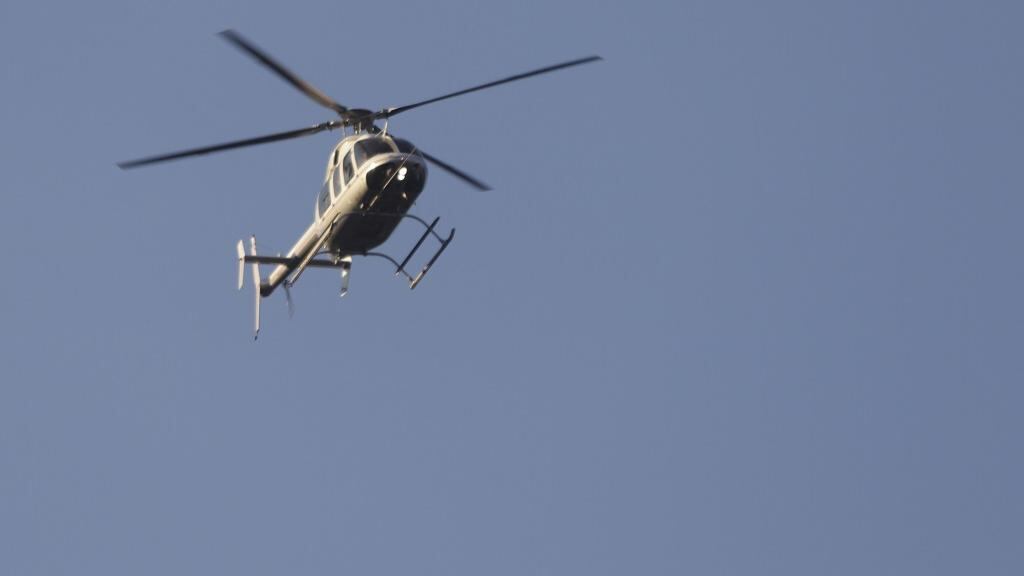 Helicóptero sobrevuela área del siniestro aéreo de Martha Érika Alonso y Rafael Moreno Valle