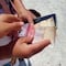 Artesana de Yucatán fue estafada por un turista; recibió fajo de billetes que no valen nada