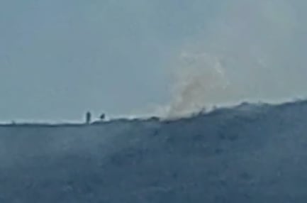 Gigantes de Tlalnepantla apagando el fuego del cerro