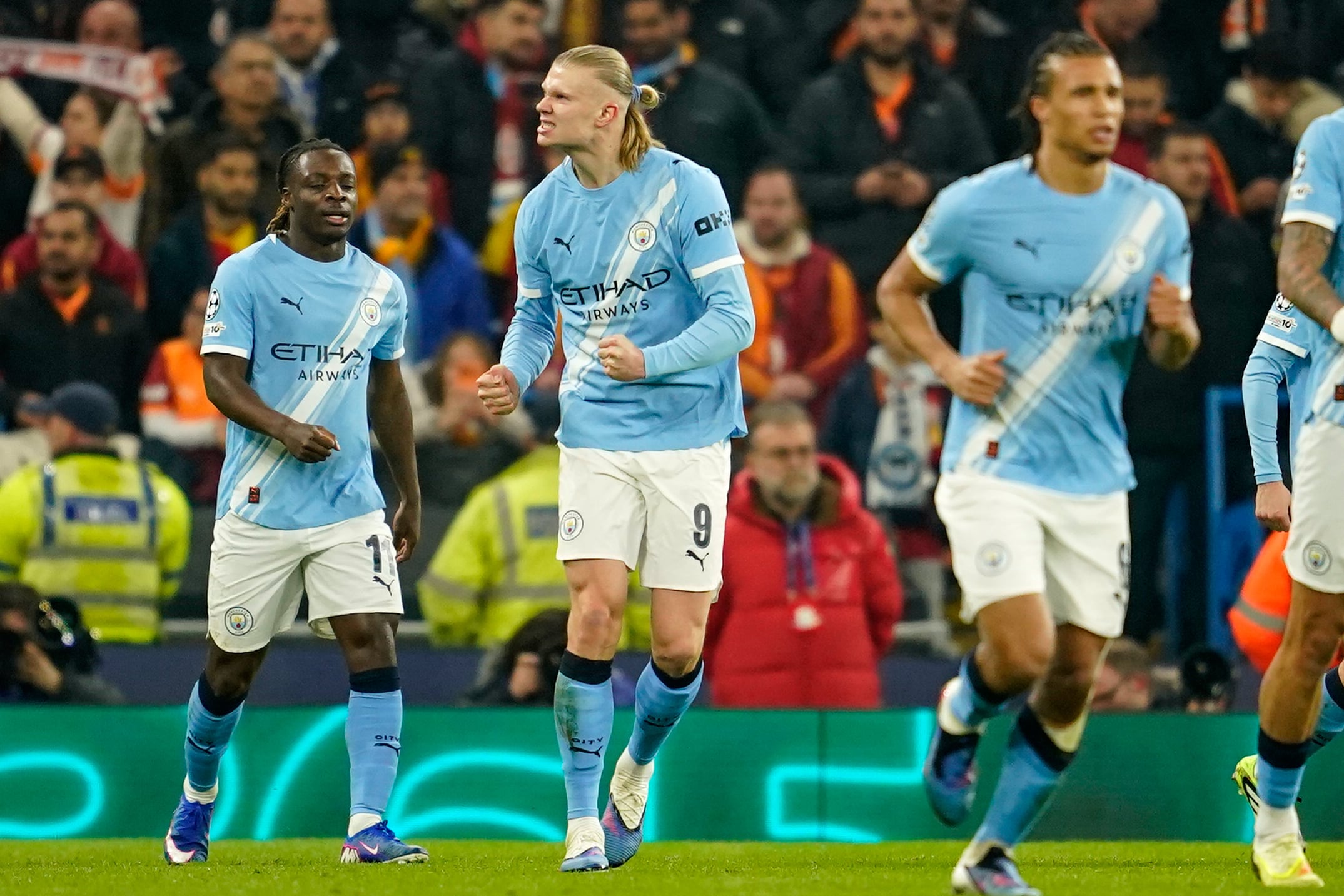 Manchester City's Erling Haaland, center, celebrates after scoring the opening goal during the Champions League opening phase soccer match Manchester City and Galatasaray in Manchester, England, Wednesday, Jan. 28, 2026. (AP Photo/Dave Thompson)