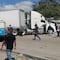 Normalistas de Ayotzinapa bloquean Autopista del Sol; pedían material didáctico