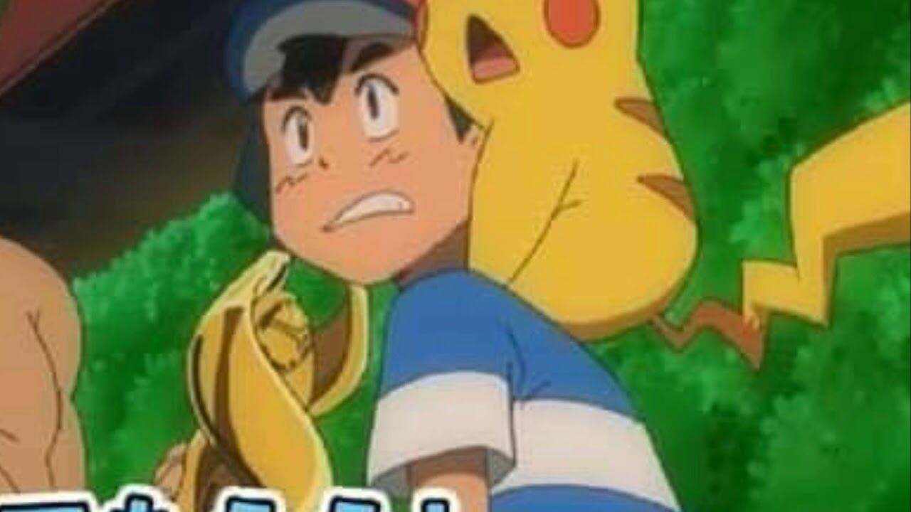 Ash con el trofeo de Alola