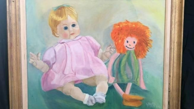 Cuadro con dos muñecas pintadas