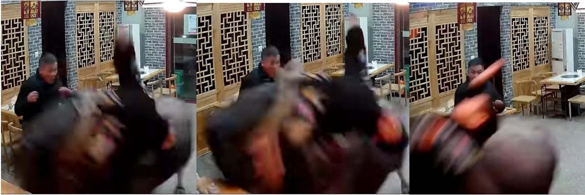 Búfalo embiste a hombre