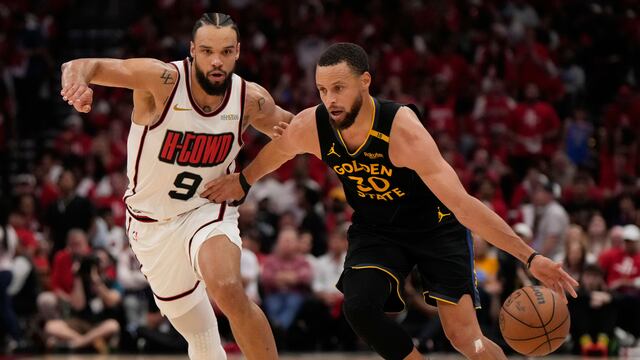 Stephen Curry y Dillon Brooks en el Warriors vs Rockets.