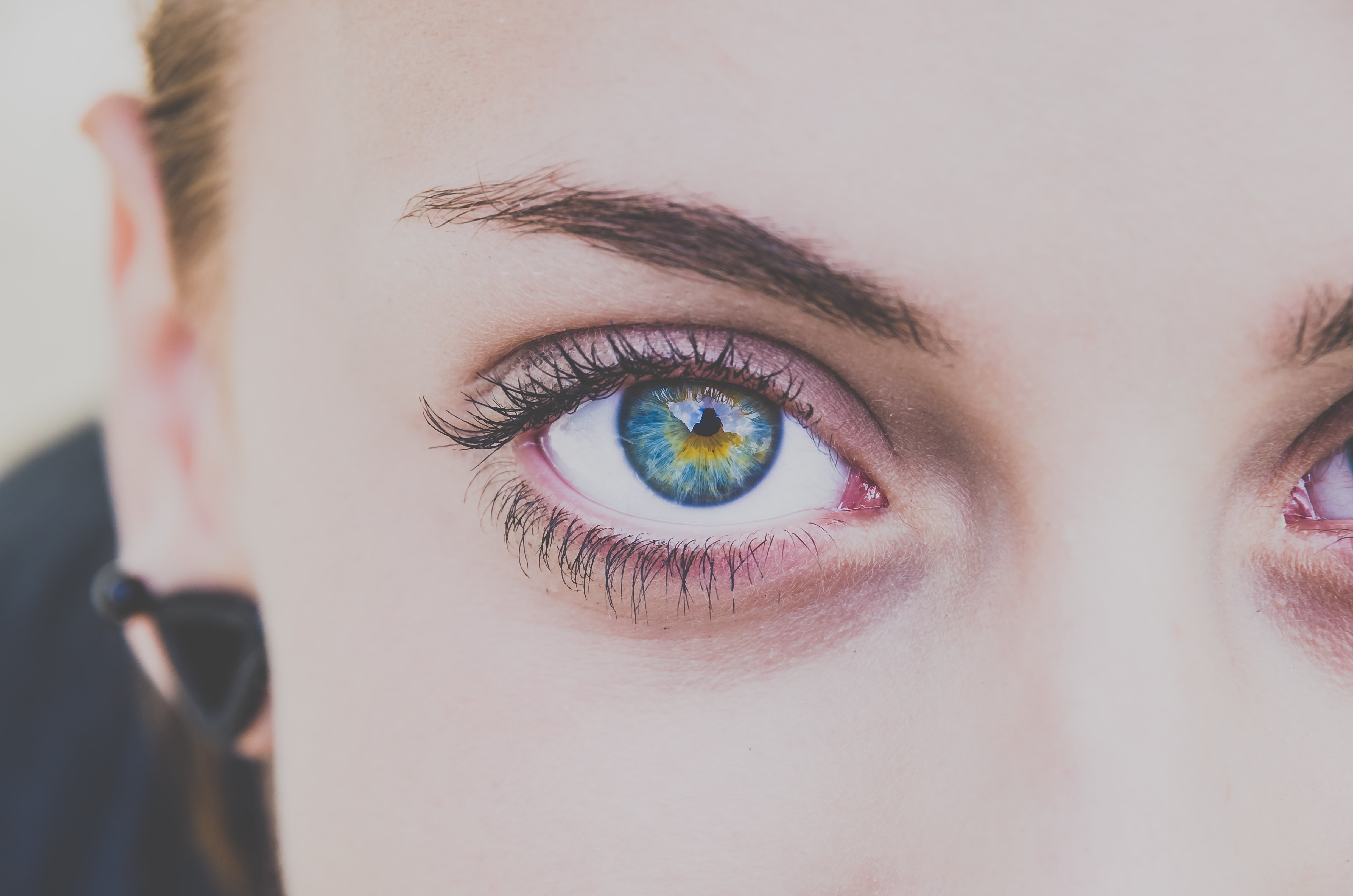 Ojos azul iris pupila