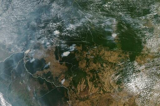 Imagen del impacto de los incendios forestales en la Amazonia tomada desde un satélite de la NASA.