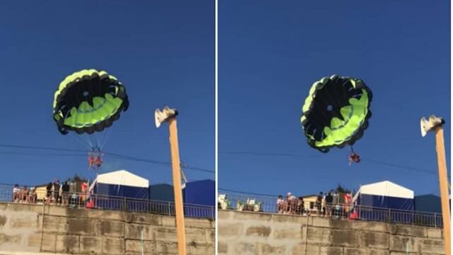 Pareja en paracaídas.