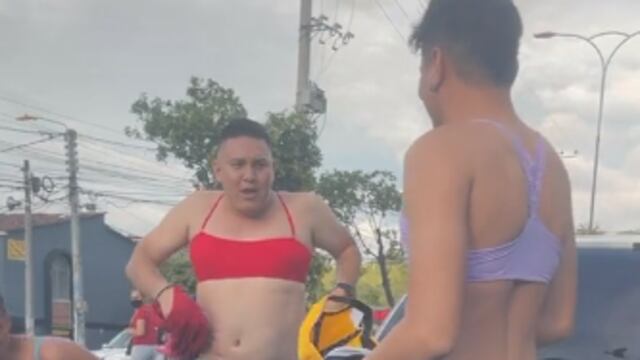 Hombres con brasier a punto de pelear