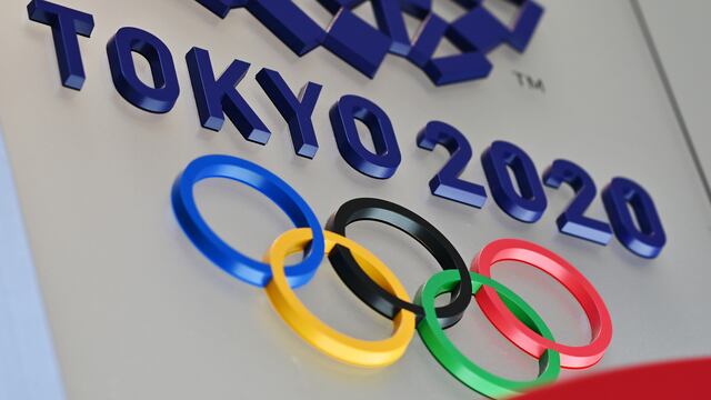The logo for the Tokyo 2020 Olympic Games is seen in Tokyo on March 15, 2020. (Photo by CHARLY TRIBALLEAU / AFP)