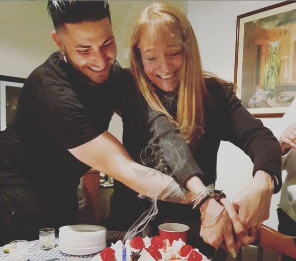 Eduardo Yáñez Jr. con Norma García.