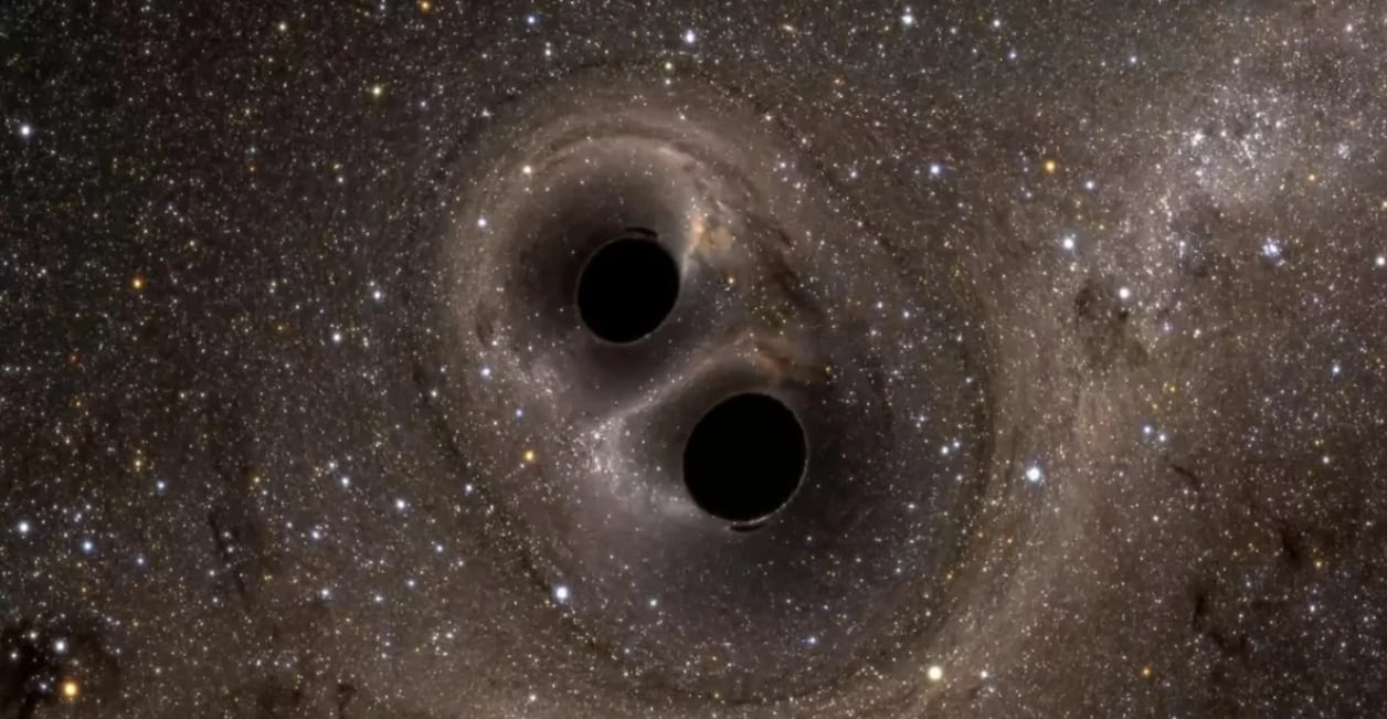 ”Abrazo” de dos agujeros negros
